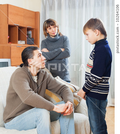 Parents berating teenager son 10264106
