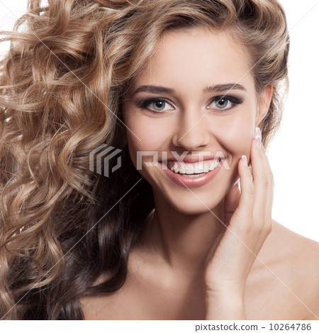 Beautiful smiling woman portrait. Isolated on white background 10264786