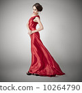 Young beauty woman in fluttering red dress. 10264790