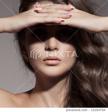 Fashion Portrait. Beautiful Brunette Girl. Curly Hair. 10264794