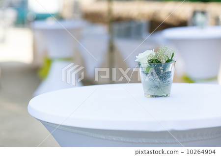 Wedding bouquets of roses at outside ceremony . 10264904