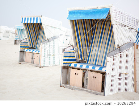 Colorful beach chairs with stripes at the beach of St.Peter Ordi 10265294