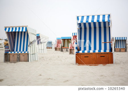 Colorful beach chairs with stripes at the beach of St.Peter Ordi Colorful beach chairs with stripes at the beach of St.Peter Ordi 10265340