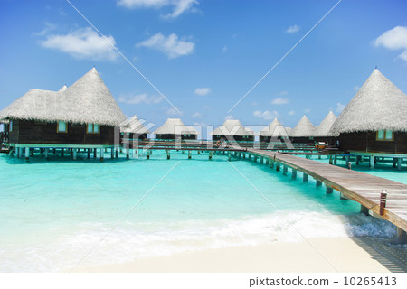 Water villas on tropical island on Maldives Water villas on tropical island on Maldives 10265413