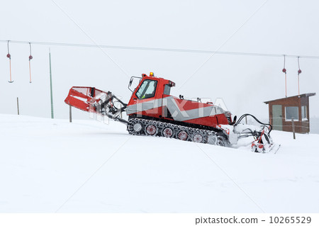 Snowplow working on a ski slope Snowplow working on a ski slope 10265529