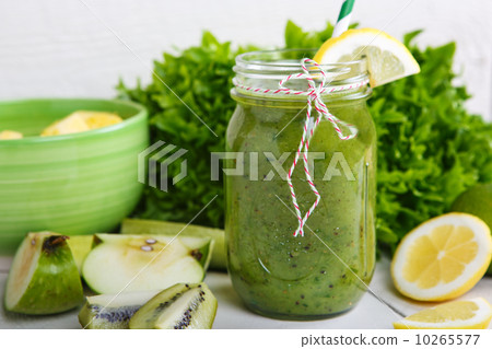 Fresh organic green smoothie with salad, apple, cucumber, pineap Fresh organic green smoothie with salad, apple, cucumber, pineap 10265577