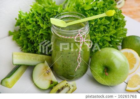 Fresh organic green smoothie with salad, apple, cucumber, pineap Fresh organic green smoothie with salad, apple, cucumber, pineap 10265768
