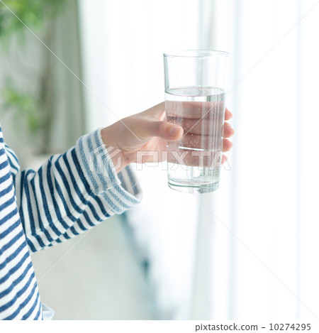 A woman with a cup 10274295
