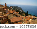 Red roof and blue sea 10275636