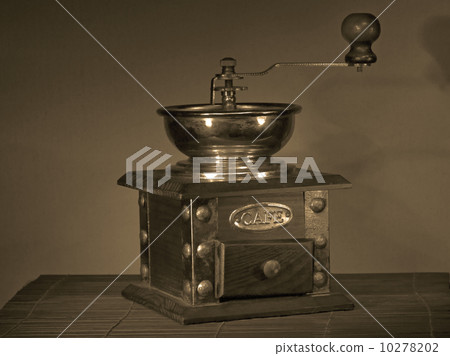 Manual coffee grinder.Sepia. 10278202