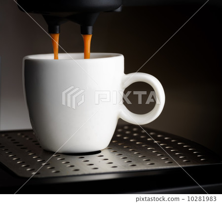 Coffee machine pouring a cup of espresso 10281983