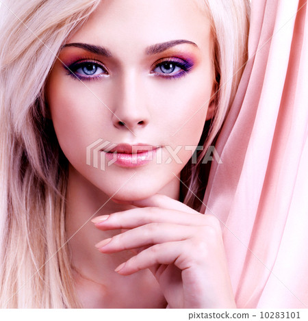 Beautiful sensual woman with pink silk. 10283101