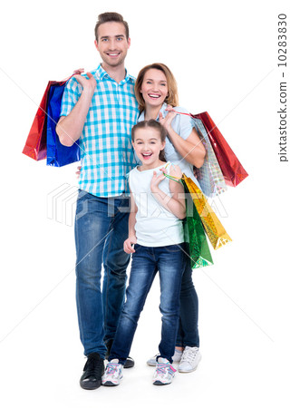 Happy american family with child holding shopping bags 10283830