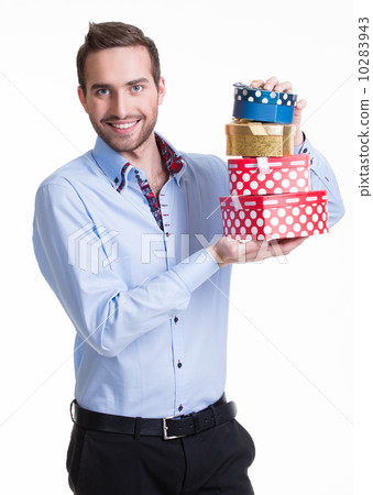Portrait of happy young man with gifts. Portrait of happy young man with gifts. 10283943
