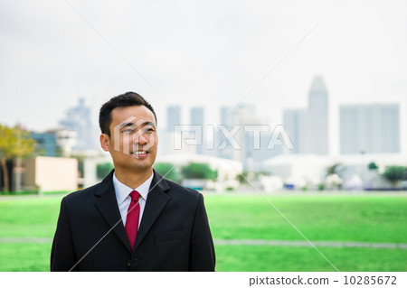 Business man with cityscape background 10285672