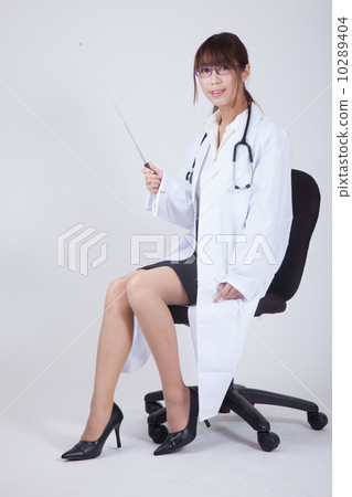 Female doctor with instruction stick 10289404