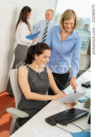 Businesswomen Discussing Document 10290870