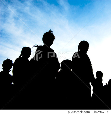 silhouette of family walking under the blue sky 10296793