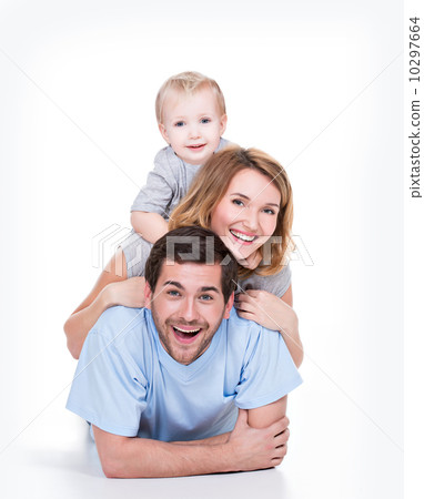 Smiling young family with little child. 10297664