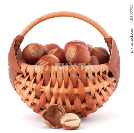 Hazelnuts in wicker basket Hazelnuts in wicker basket 10297796