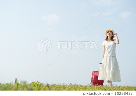 走帶著手提箱的婦女 10298452