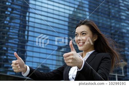Asian business woman showing the all good sign Asian business woman showing the all good sign 10299191