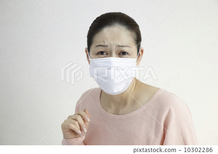 Mask and female middle age Mask and female middle age 10302286