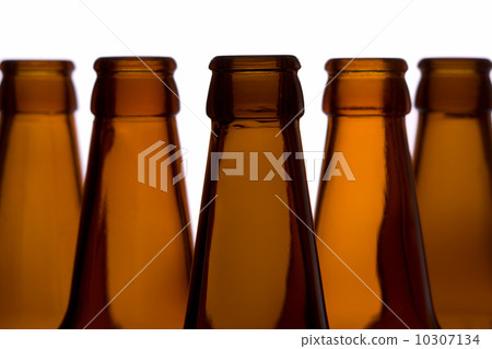 Closeup of empty bottles on a gleam 10307134