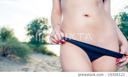 Pretty belly and black panties undresing outdoors 10308121