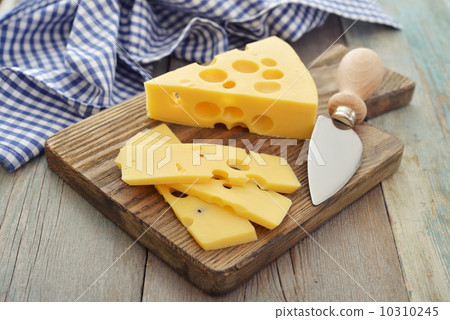 Cheese with big holes Cheese with big holes 10310245