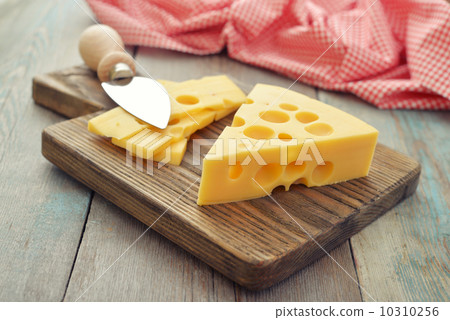 Cheese with big holes Cheese with big holes 10310256