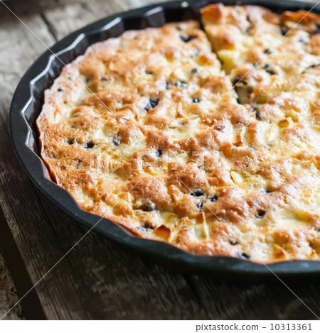 Tart from Eggs with Black berries on Wooden Table 10313361