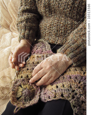 Knitting and senior hands 10313386
