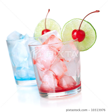 Two cocktails with lime slice and maraschino Two cocktails with lime slice and maraschino 10313976