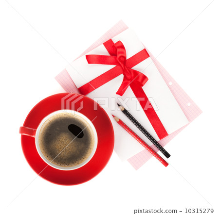 Red coffee cup and love letter with bow 10315279