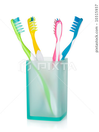 Four multicolored toothbrushes Four multicolored toothbrushes 10315937