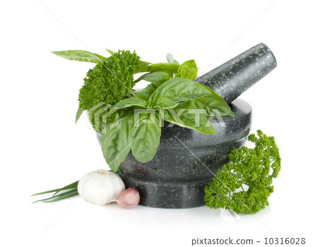 Fresh flavoring herbs and spices in mortar Fresh flavoring herbs and spices in mortar 10316028