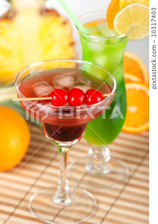 Green and red tropical cocktails 10317403