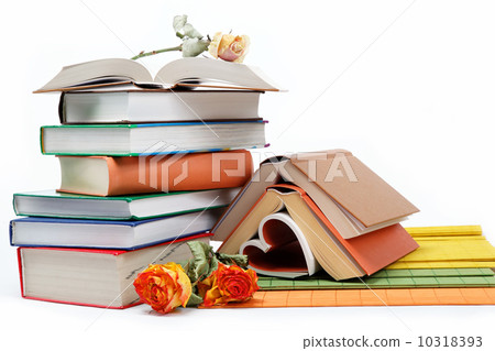 A stack of books on a white background. A stack of books on a white background. 10318393
