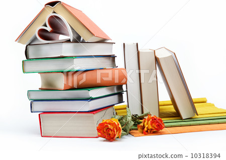 A stack of books on a white background. 10318394