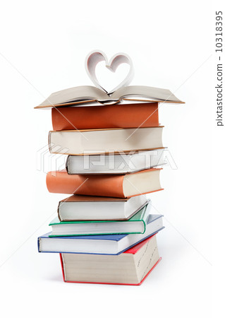A stack of books on a white background. A stack of books on a white background. 10318395