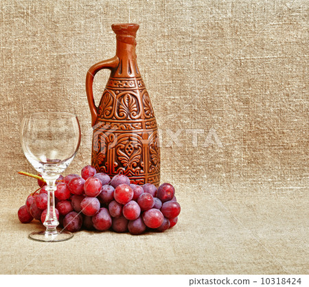 Bottle, grapes and a glass on canvas Bottle, grapes and a glass on canvas 10318424
