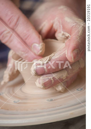Hands of a potter Hands of a potter 10319191