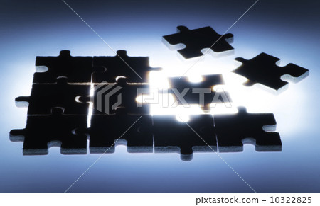 Wooden puzzle and backlight background 10322825