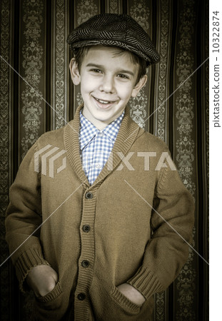 Smiling child in vintage clothes and hat Smiling child in vintage clothes and hat 10322874