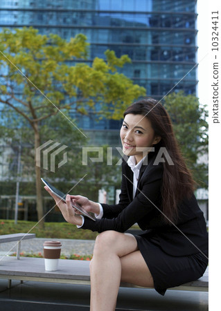 Asian business woman taking a break 10324411