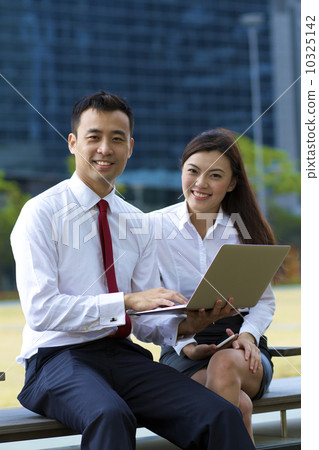 Confident Asian Business People 10325142