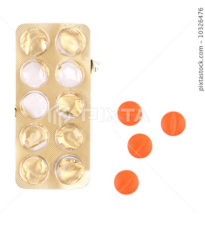 Closeup of pill package and pills. Closeup of pill package and pills. 10326476