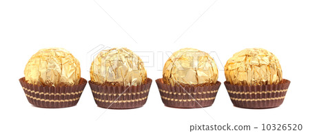 Four in row chocolate bonbons. 10326520