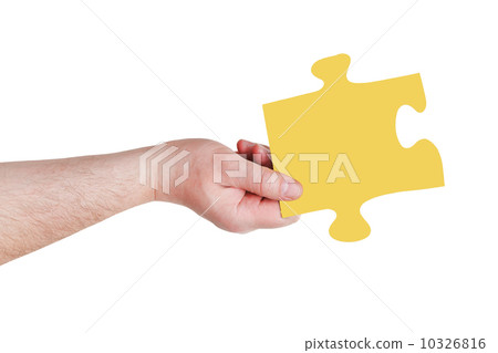 male hand with yellow puzzle piece male hand with yellow puzzle piece 10326816